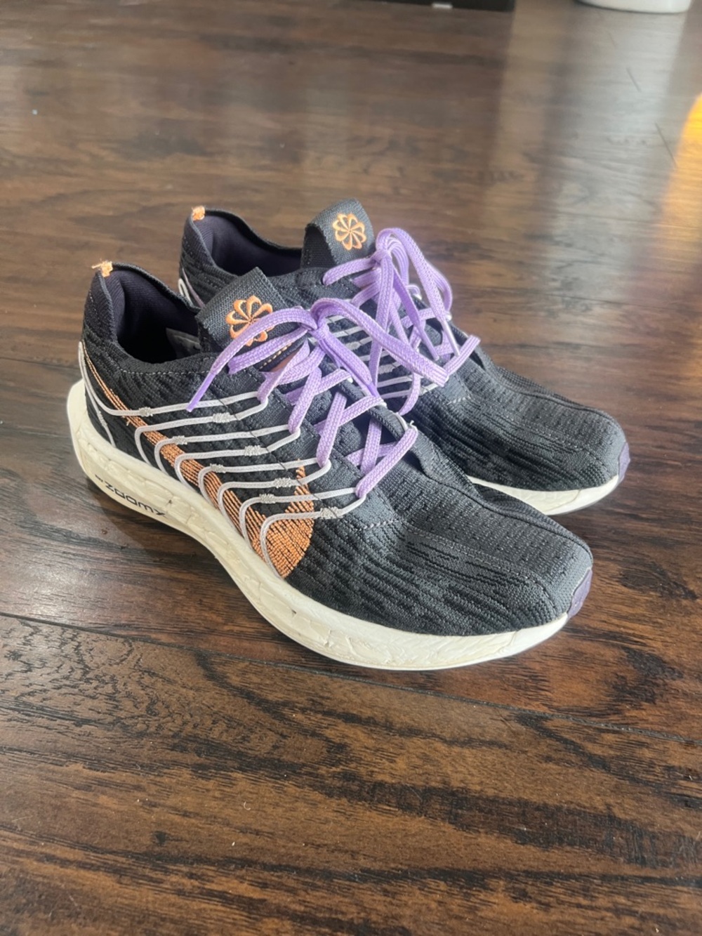 Nike Woman’s ZoomX running shoe grey/orange/purple size 9